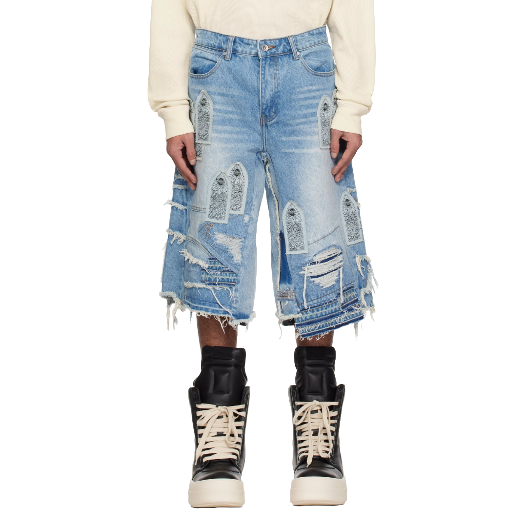 PATCHED ARCH BLOWOUT DENIM SHORT